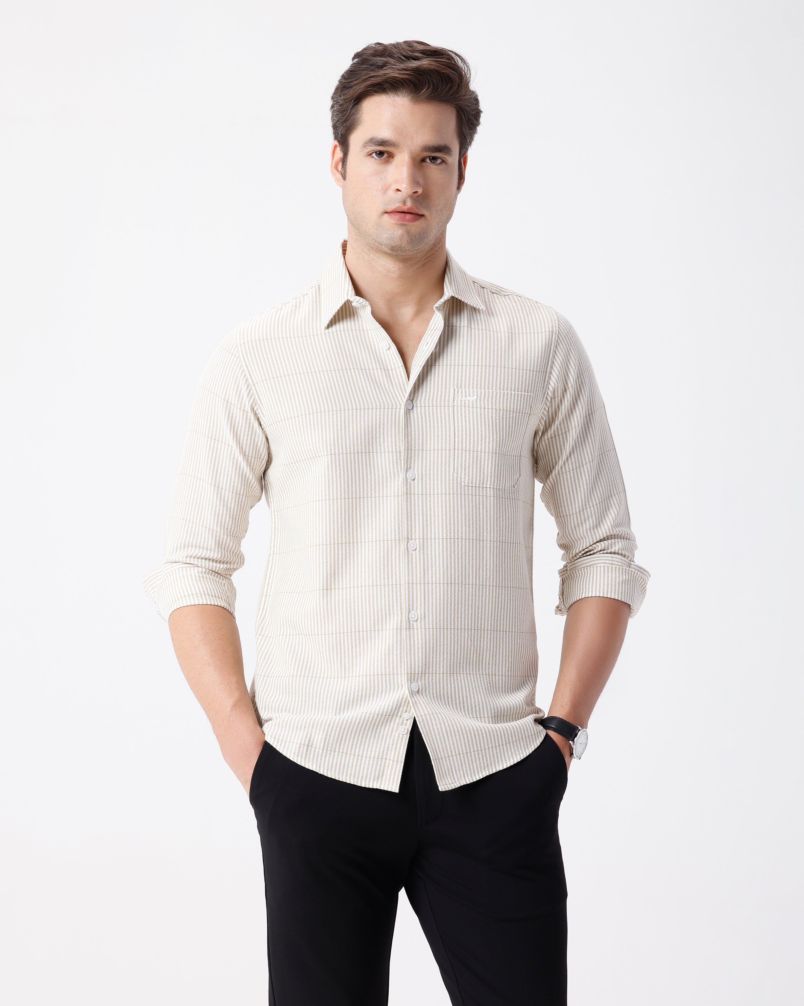 Man wearing a olive crepe texture stripe shirt olive on a light gray background