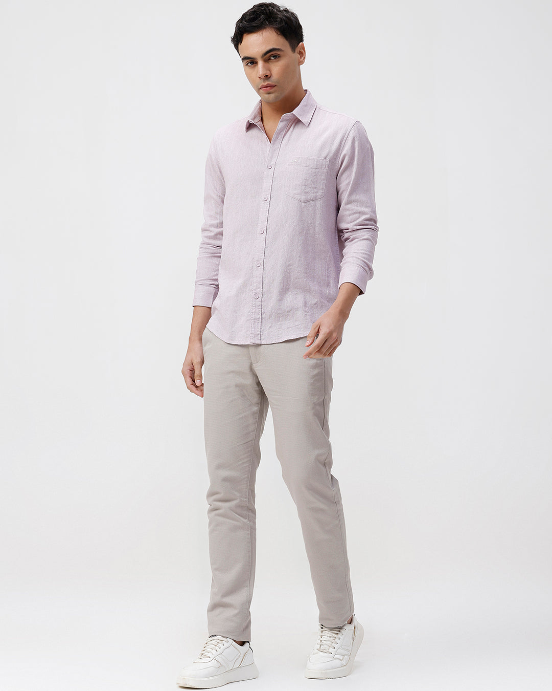 Man wearing a red rib textured cotton shirt light purple on a light gray background