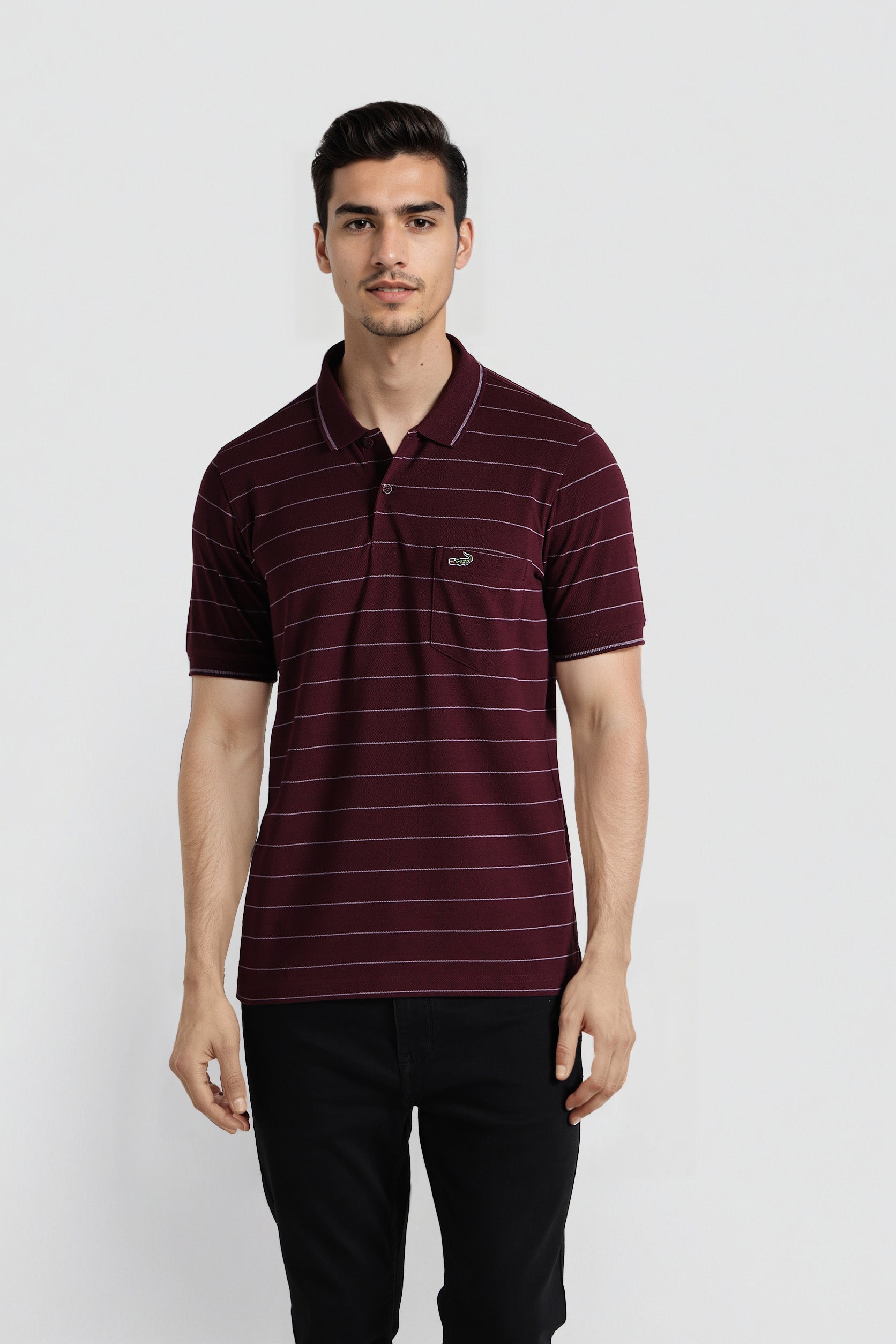 Man wearing a maroon striped polo shirt on a white background