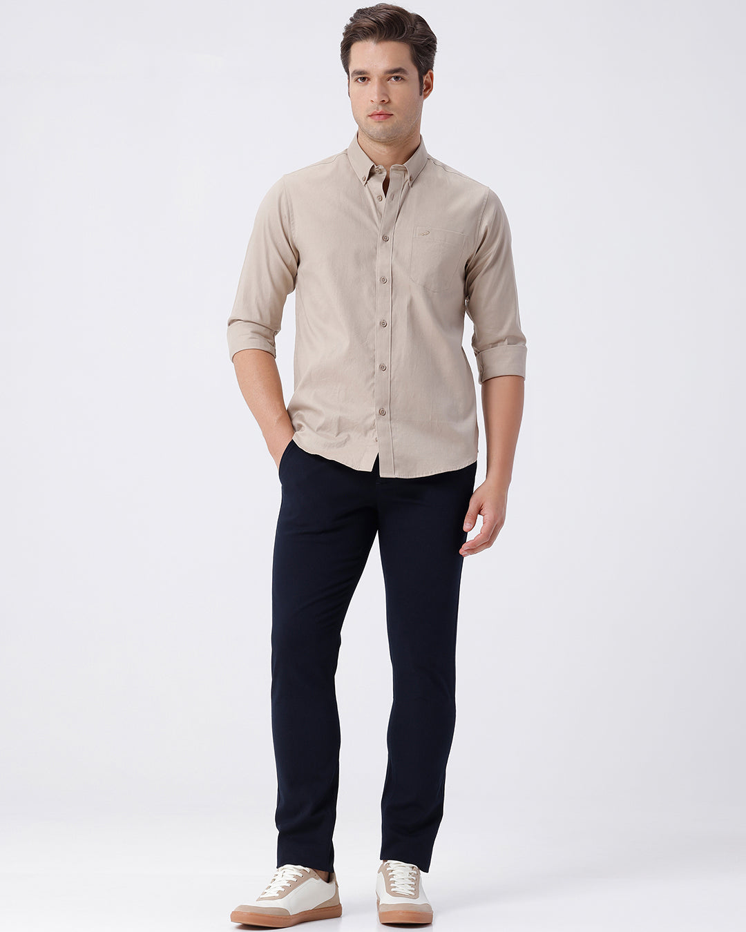 Man wearing a red textured essential chinos navy with casual styling on a gray background
