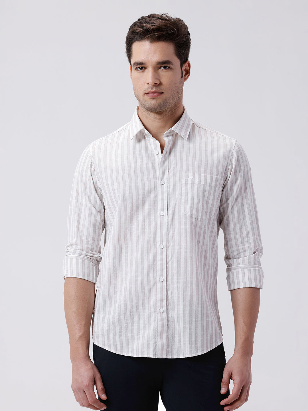 Man wearing a red stripe textured pure cotton shirt light grape with casual styling on a gray background