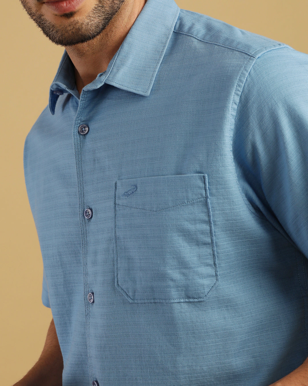 Close-up of blue fabric with texture detail