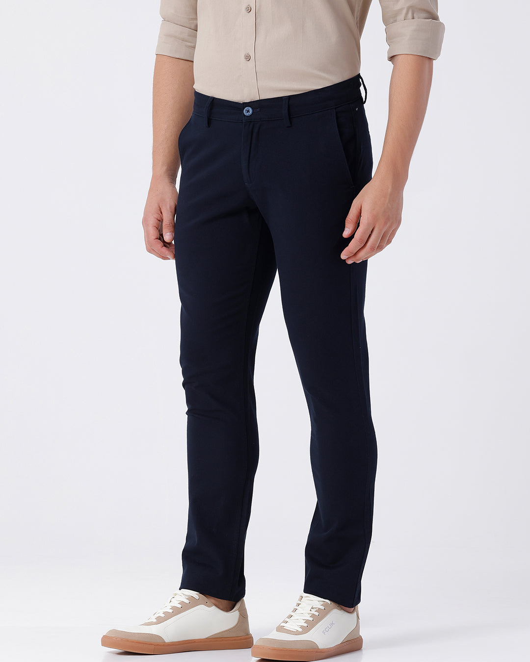 Man wearing a red textured essential chinos navy with casual styling on a gray background