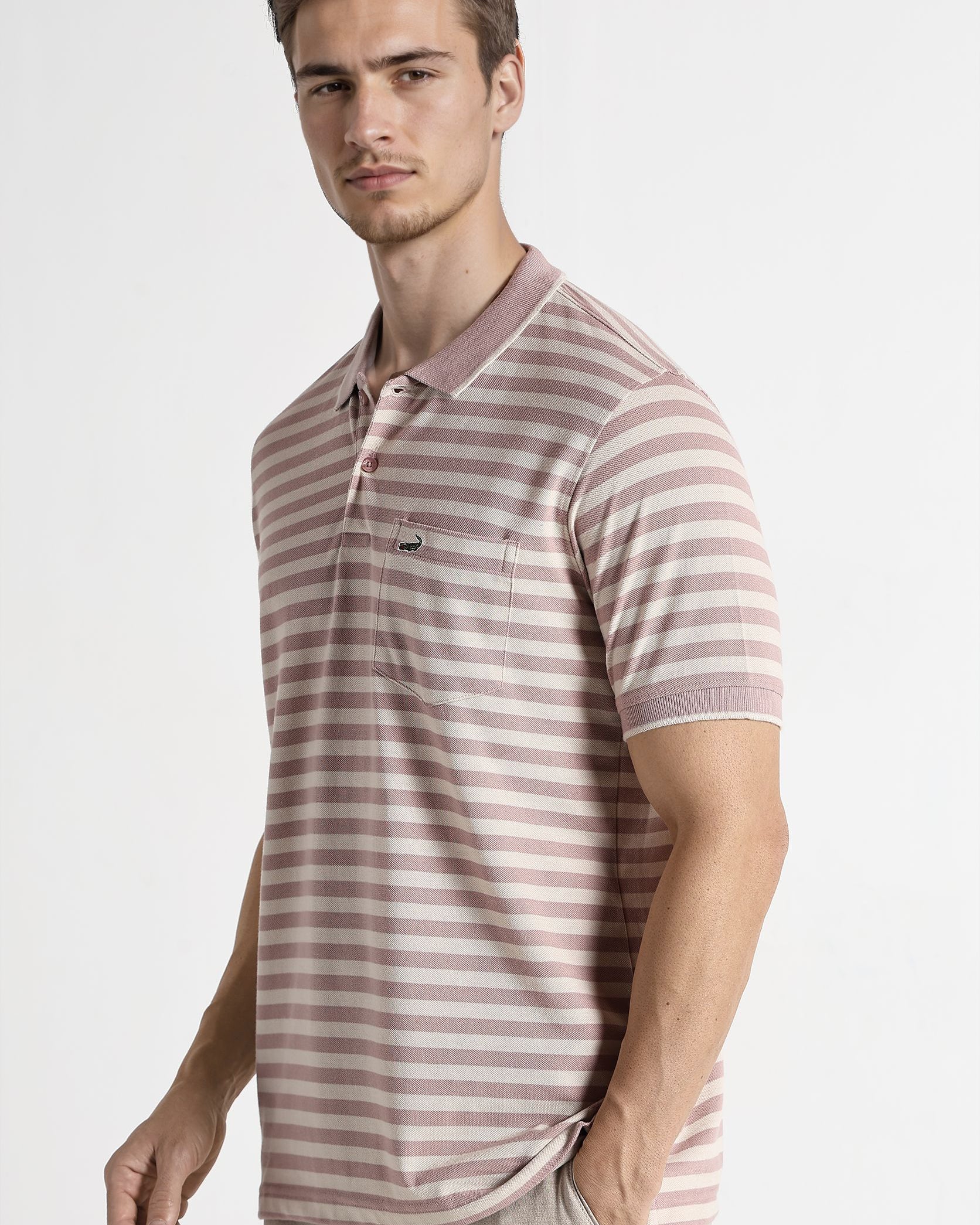 Man wearing a striped polo shirt on a white background