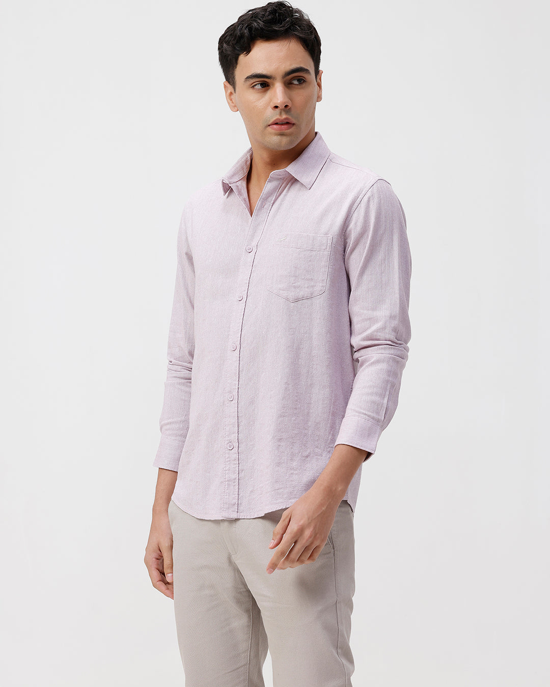 Man wearing a red rib textured cotton shirt light purple on a light gray background