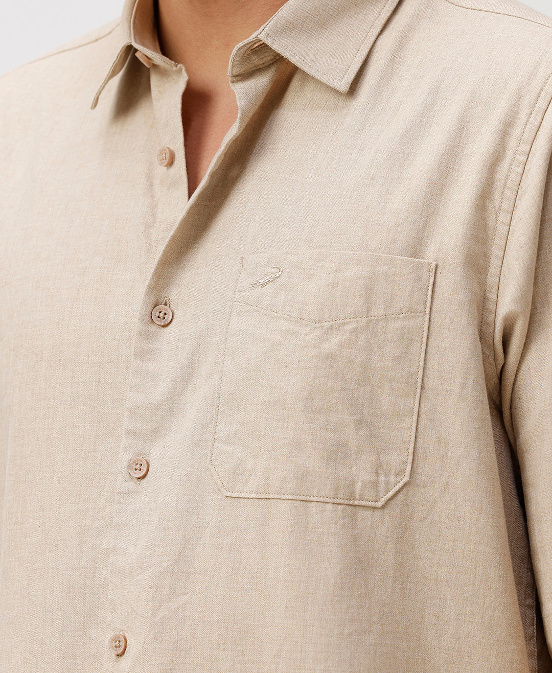 Close-up of beige fabric with texture detail
