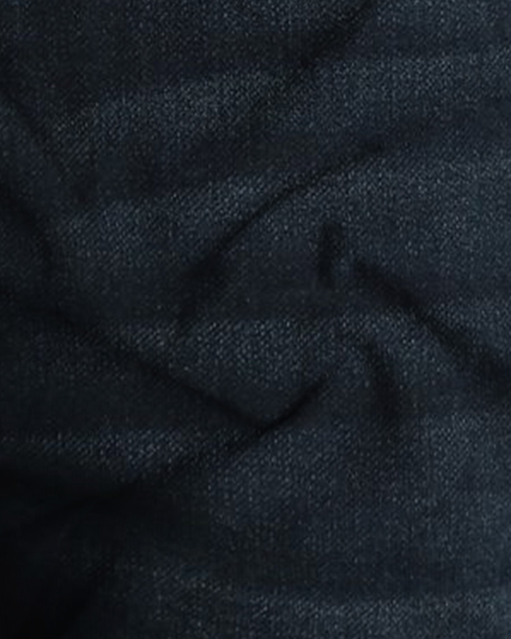 Close-up of dark blue fabric texture