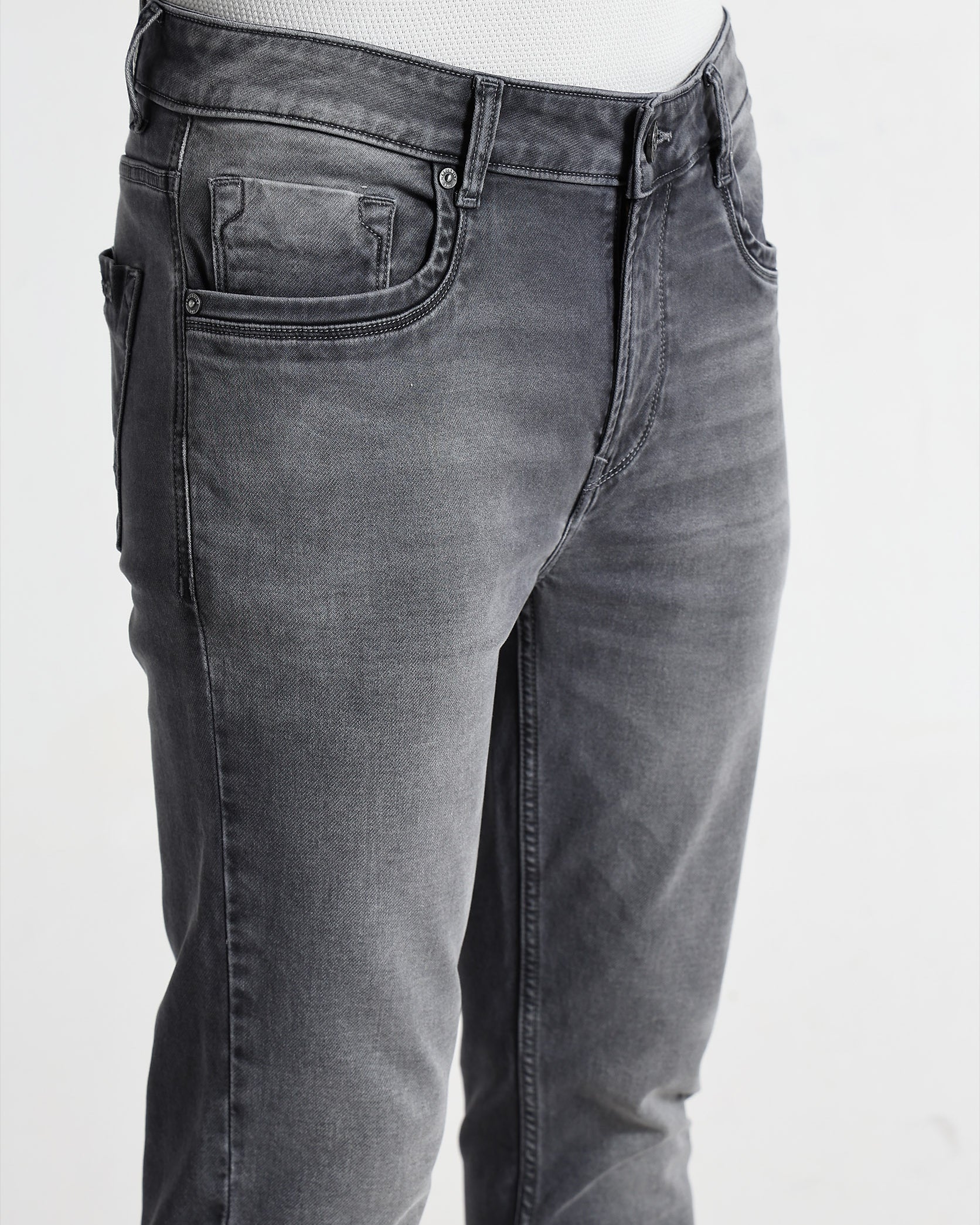 Gray jeans on a white background