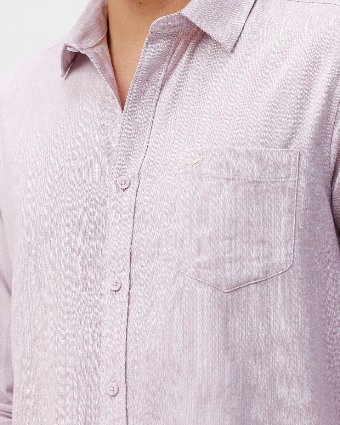 Man wearing a red rib textured cotton shirt light purple on a light gray background