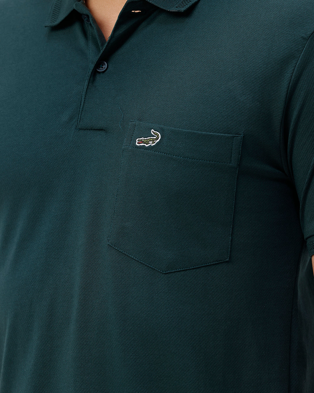 Close-up of green fabric with texture detail