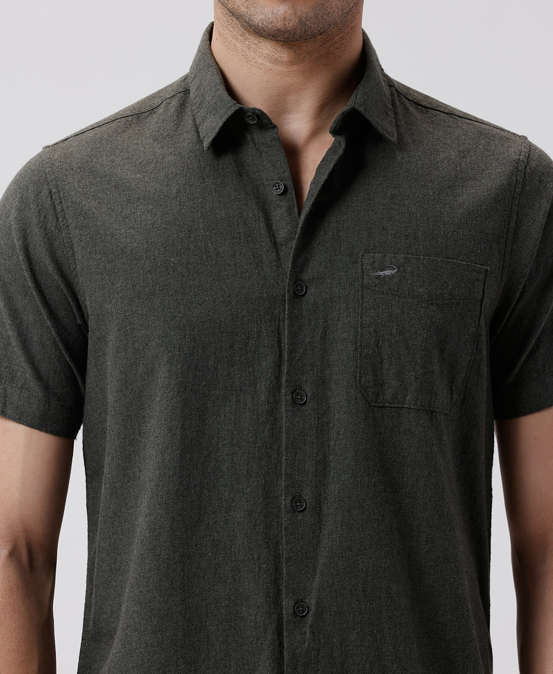 Close-up of olive fabric with texture detail