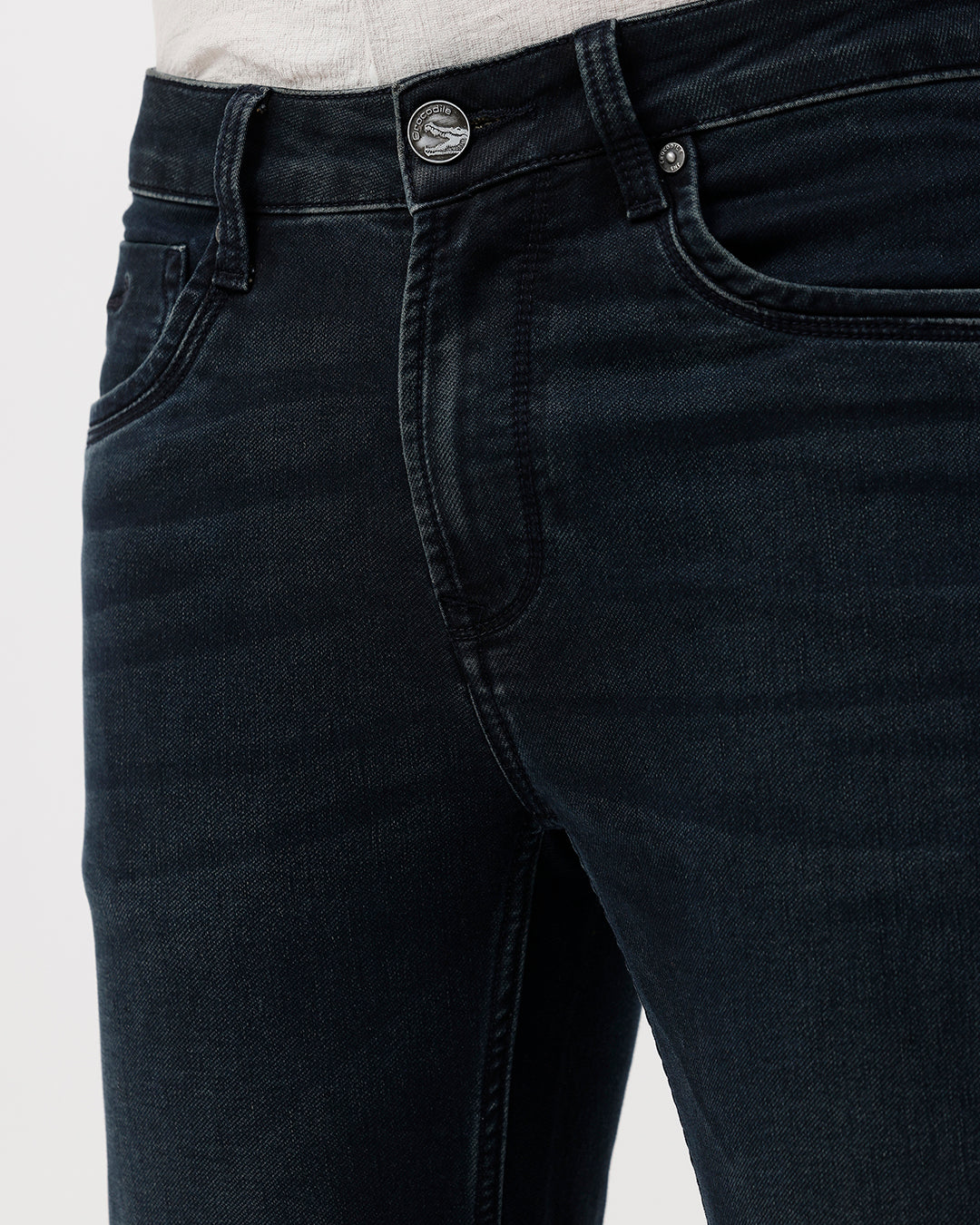 Black jeans with a visible brand logo on a white background