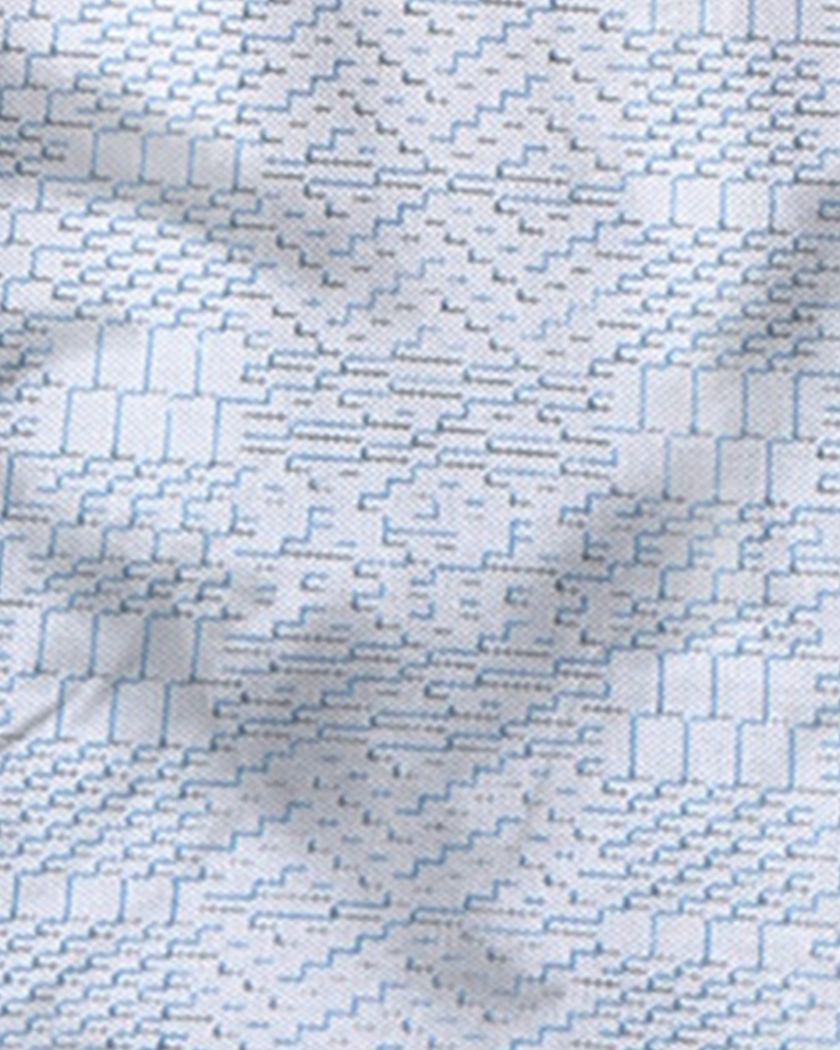 Close-up of fabric with a subtle pattern on a white background