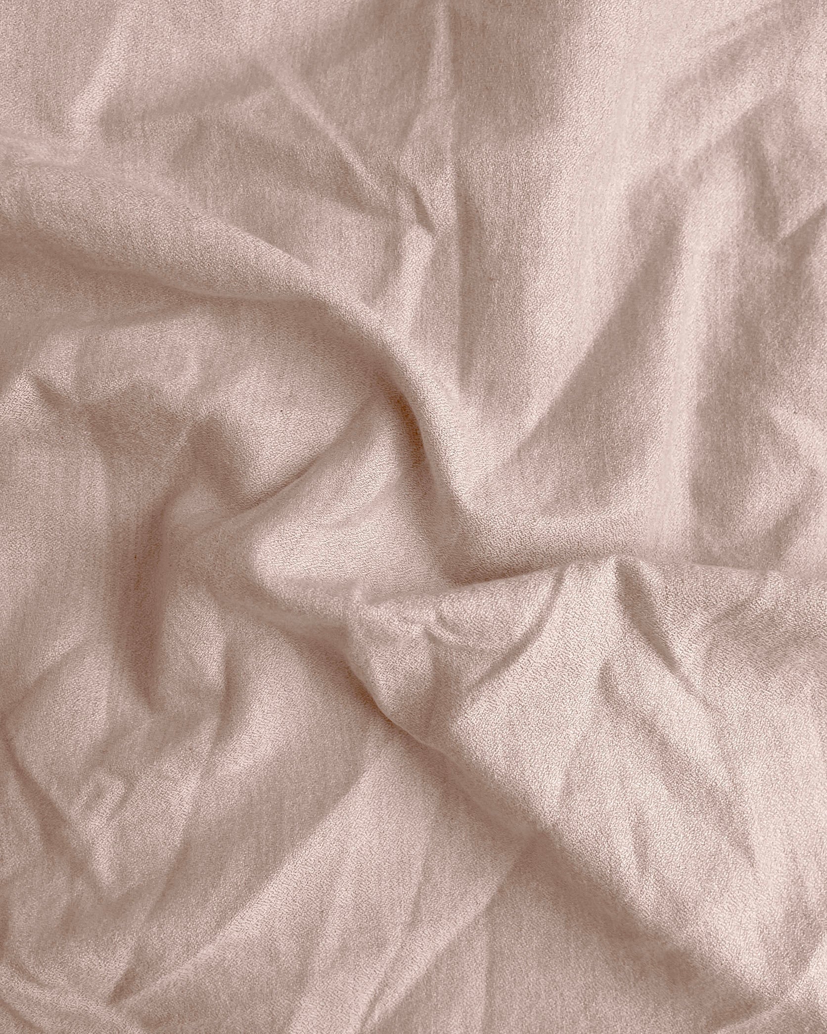 Close-up of crumpled beige fabric