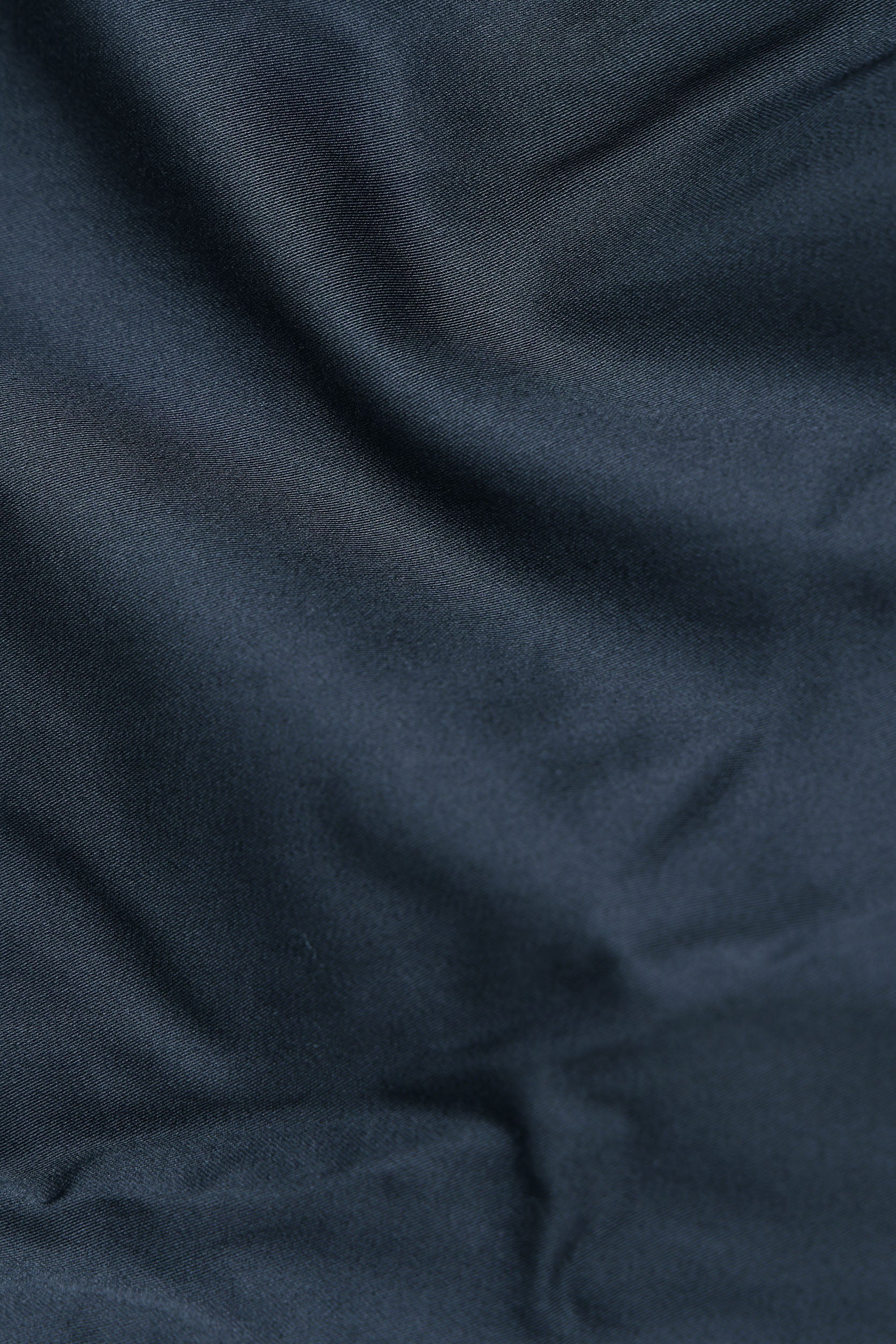 Close-up of dark blue fabric texture