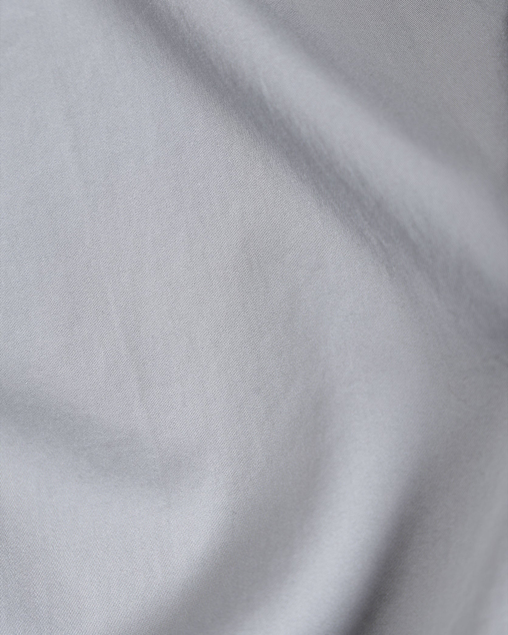 Close-up of gray fabric with a subtle pattern