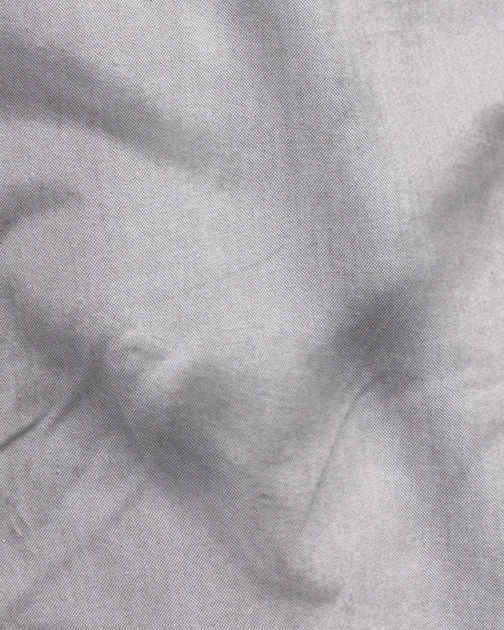 Gray textured fabric with folds