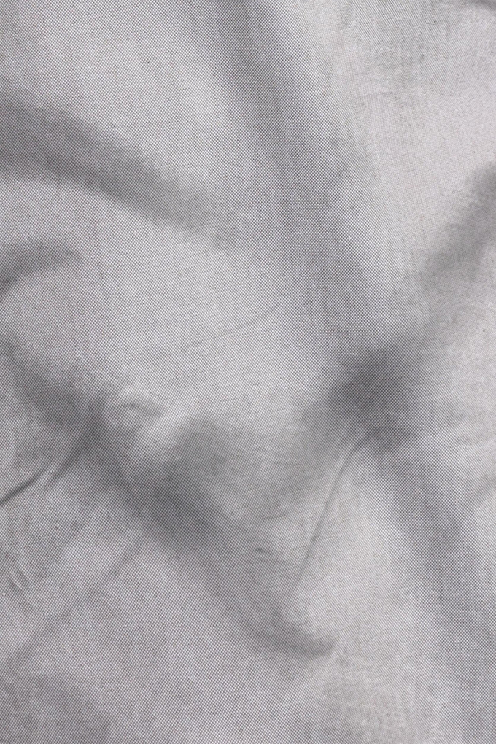 Gray textured fabric with folds