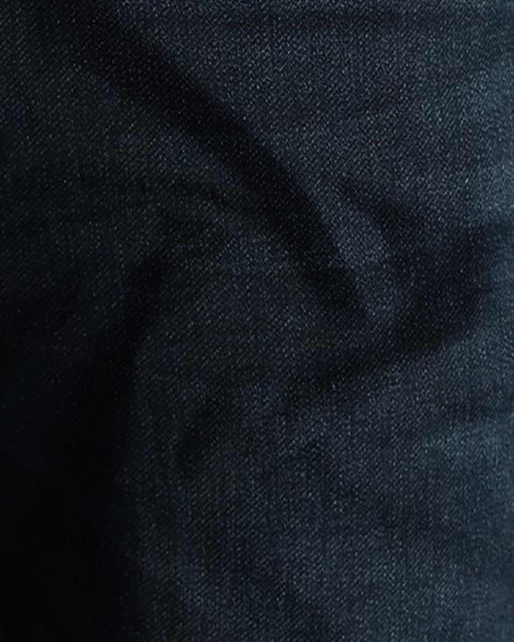 Close-up of dark blue fabric texture