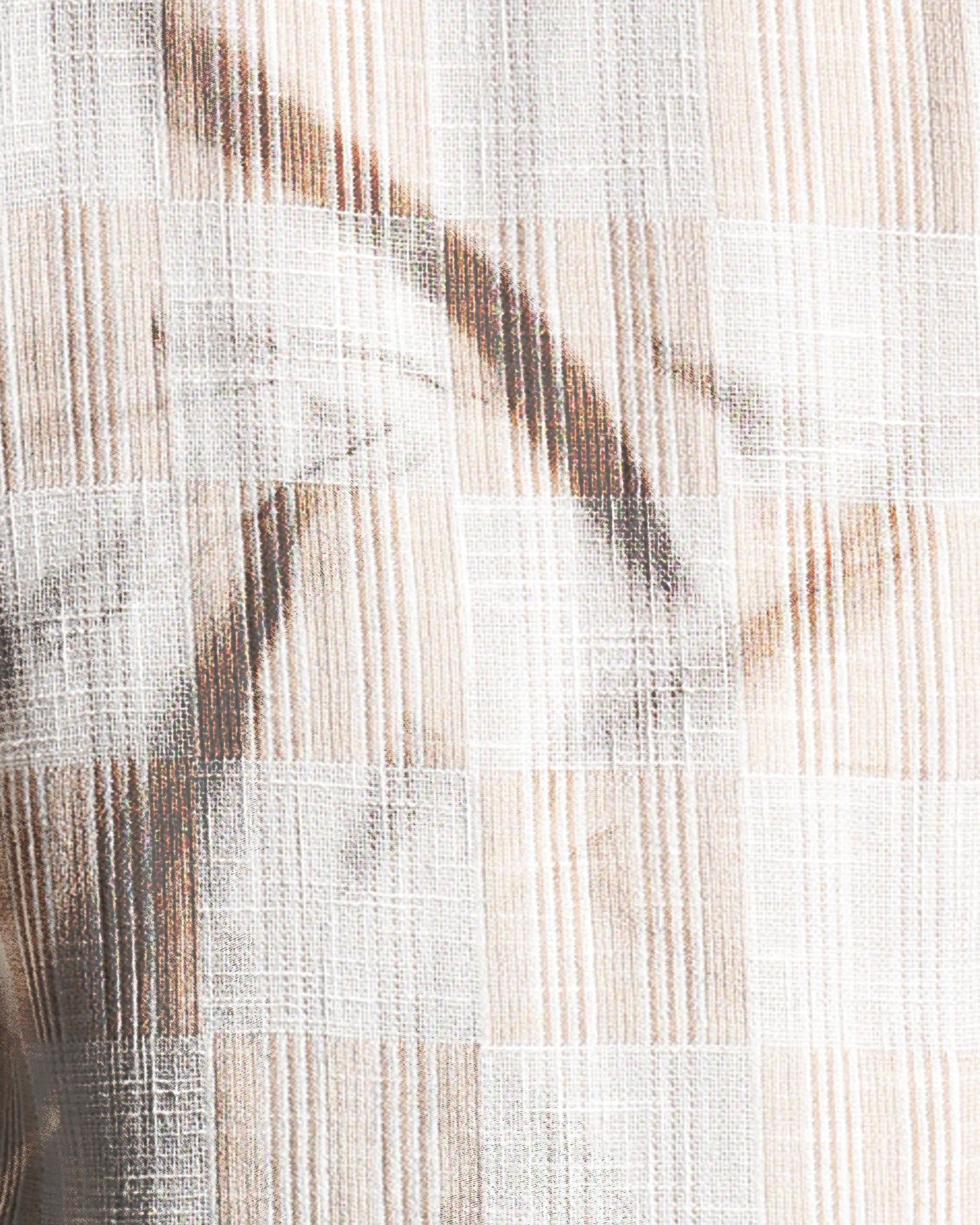 Close-up of woven fabric with a neutral color palette
