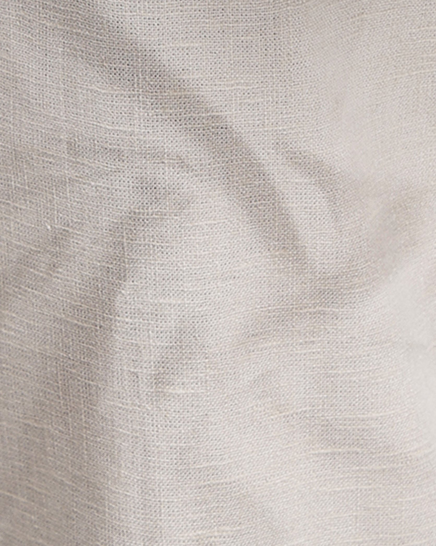 Close-up of textured beige fabric