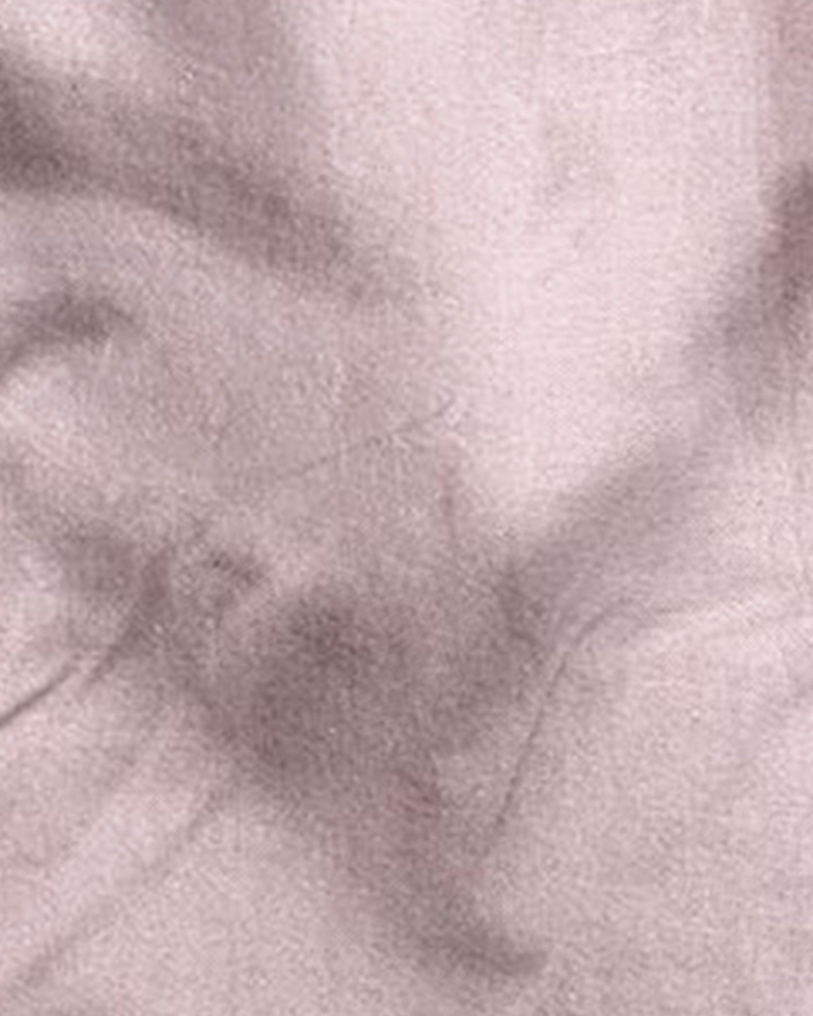 Close-up of a textured pink fabric surface