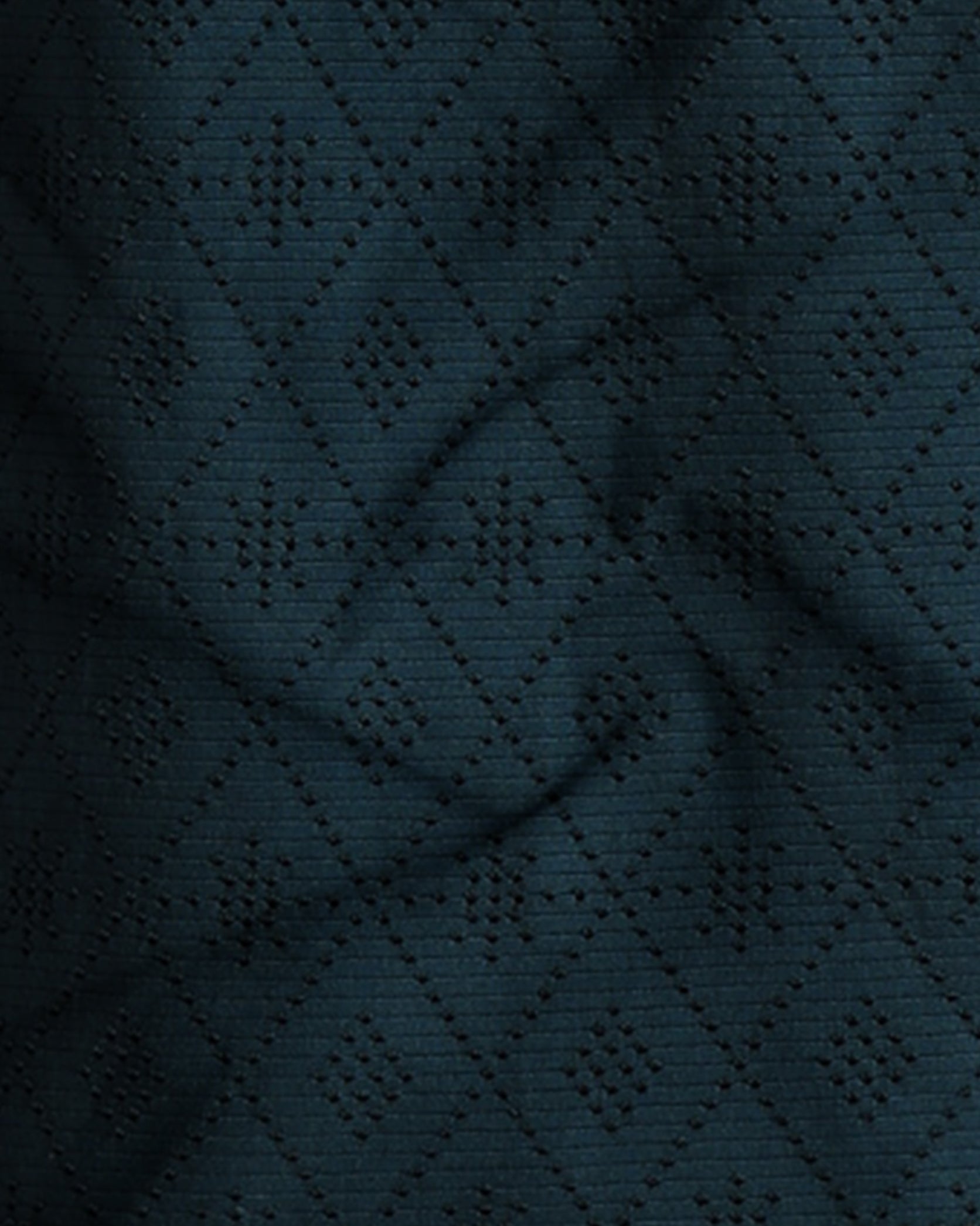 Dark blue fabric with a diamond pattern
