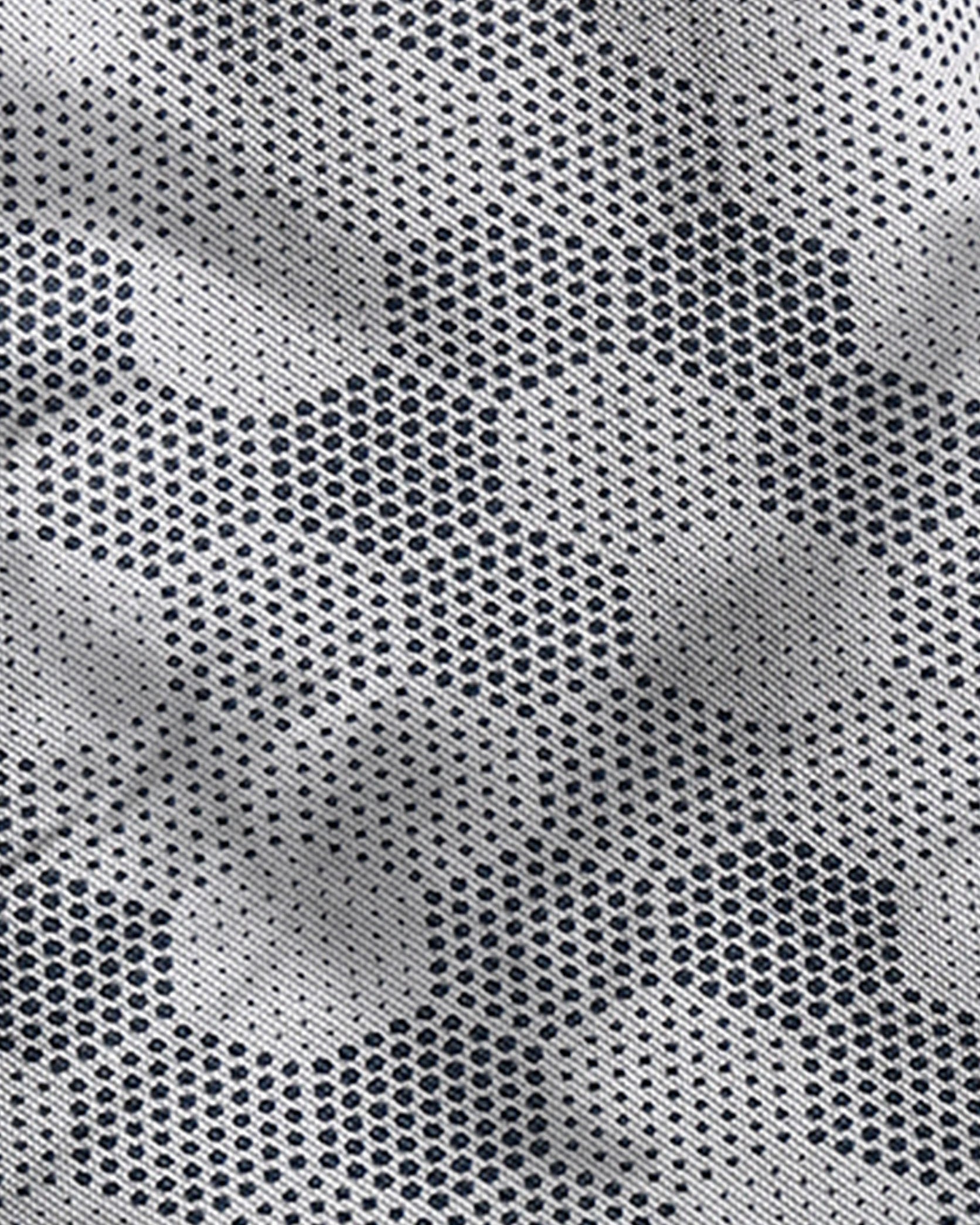 Close-up of a textured fabric with a geometric pattern