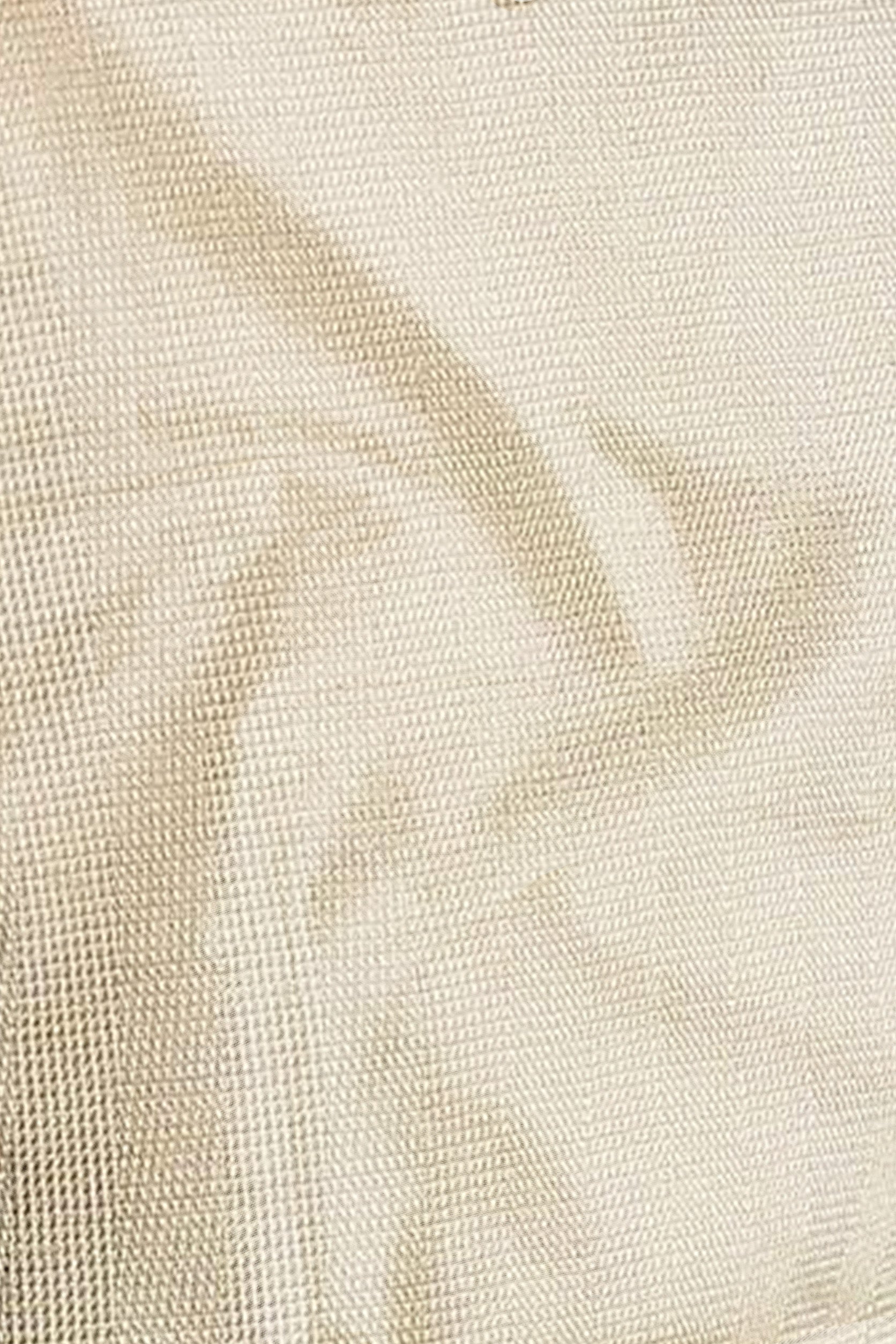 Close-up of beige fabric texture