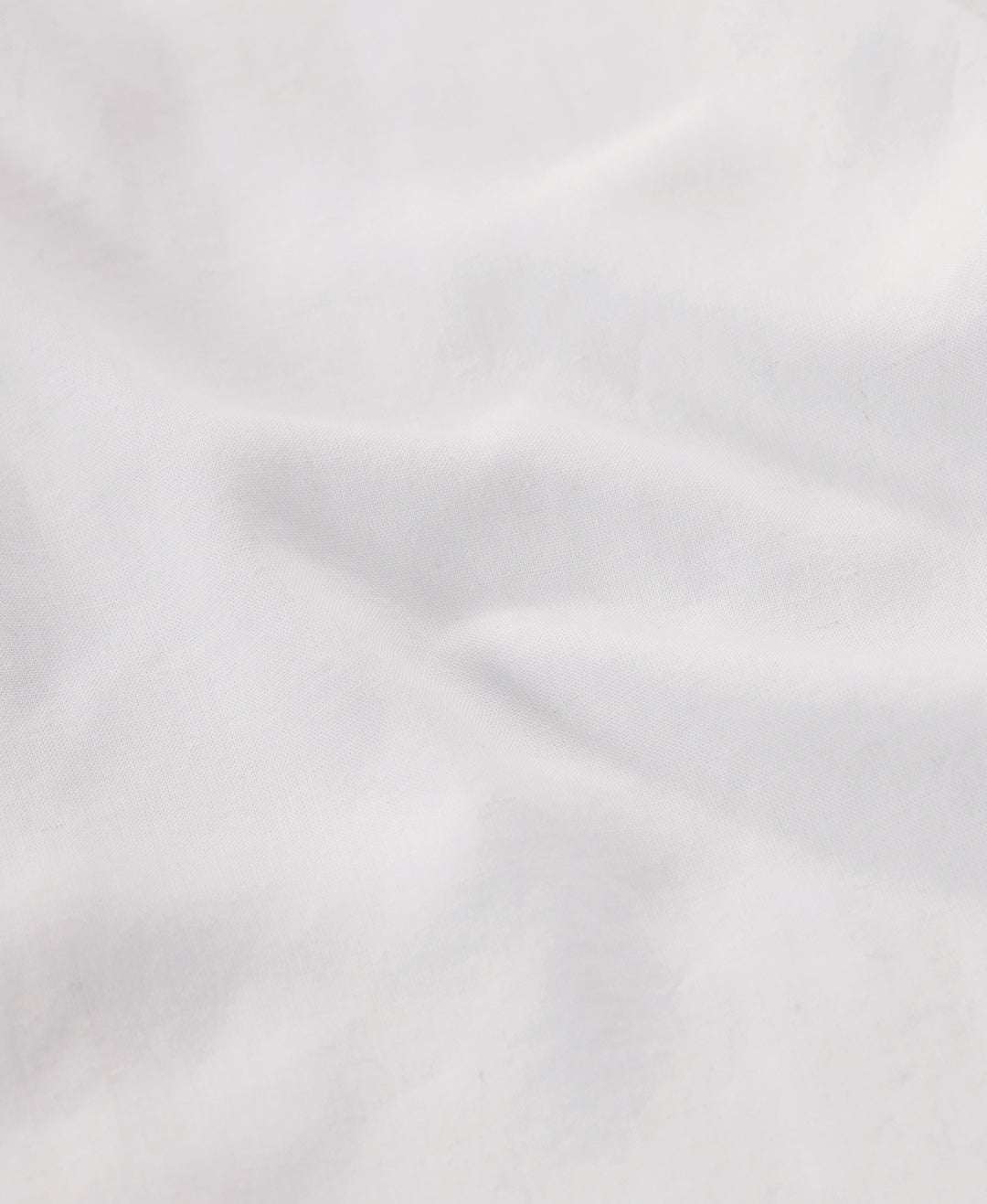 Close-up of white fabric with texture detail