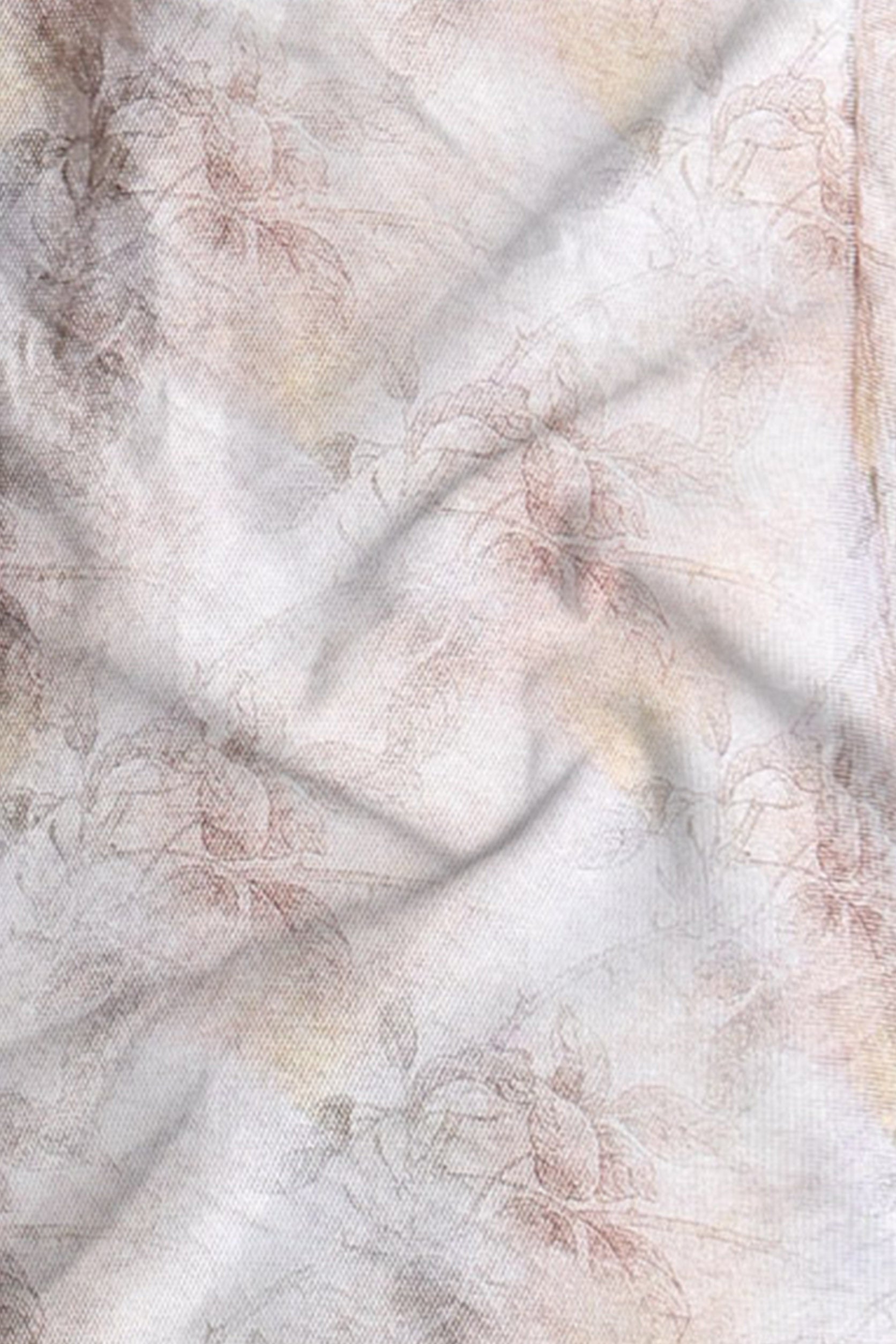 Textured fabric with a subtle pattern in neutral tones