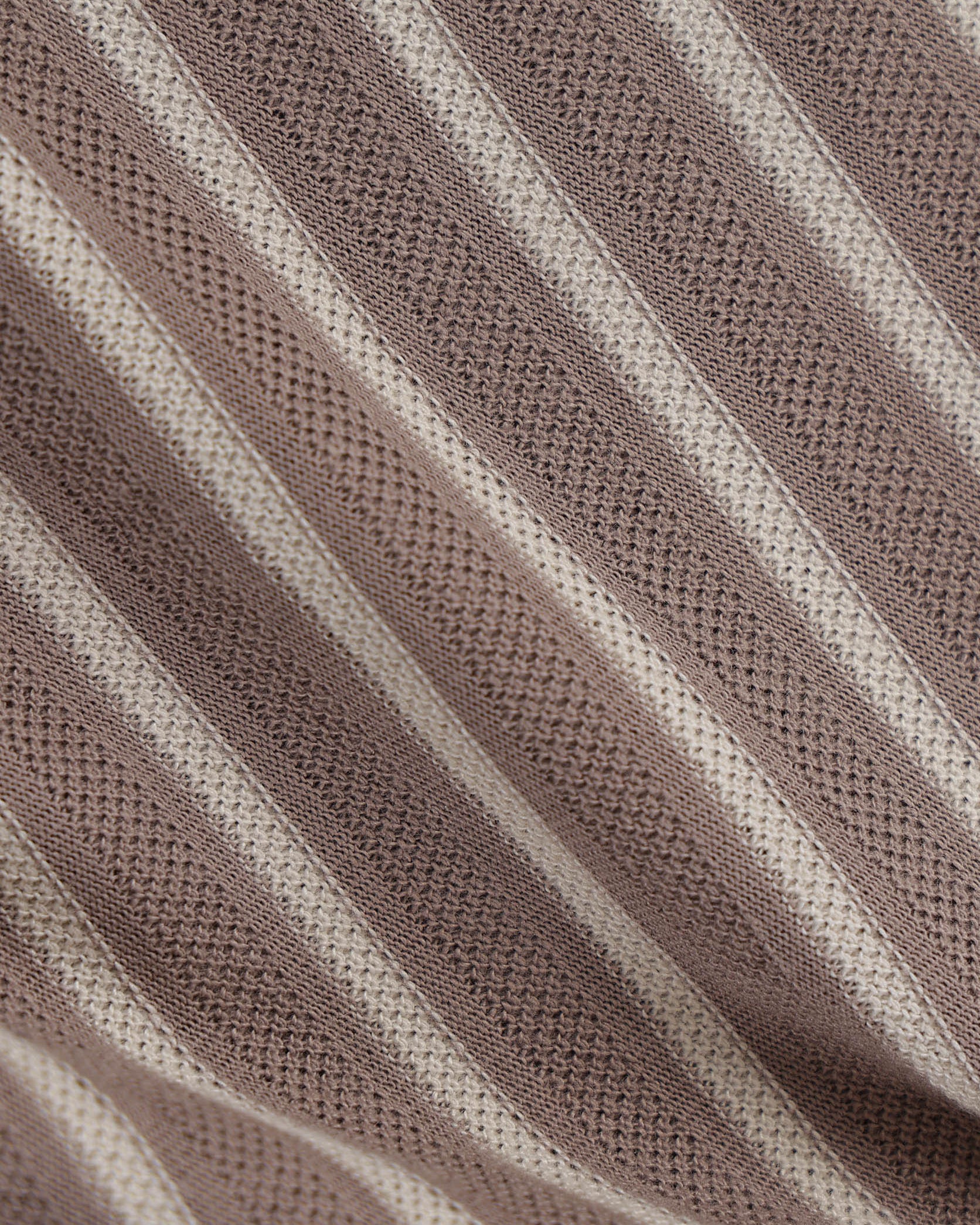 Close-up of brown fabric with a textured pattern