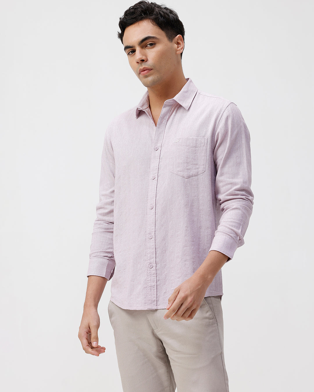Man wearing a red rib textured cotton shirt light purple on a light gray background