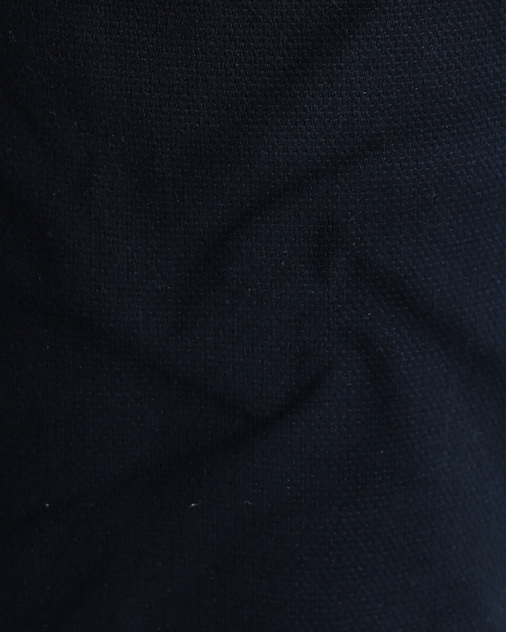 Close-up of dark blue fabric texture