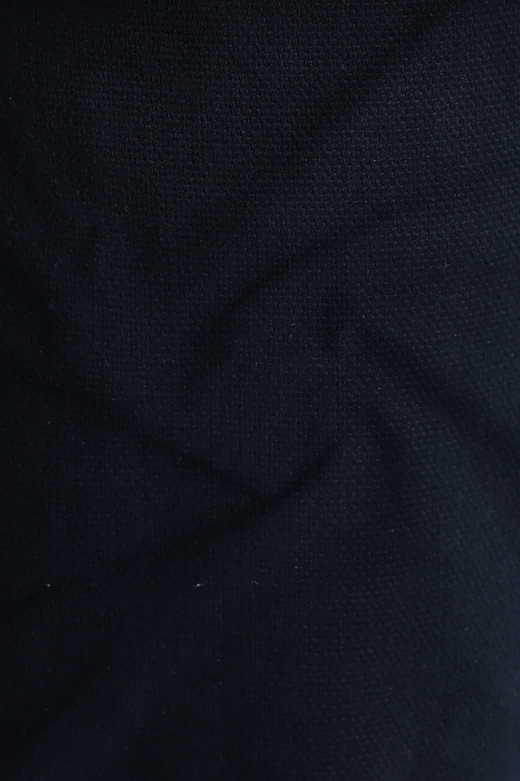 Close-up of dark blue fabric texture