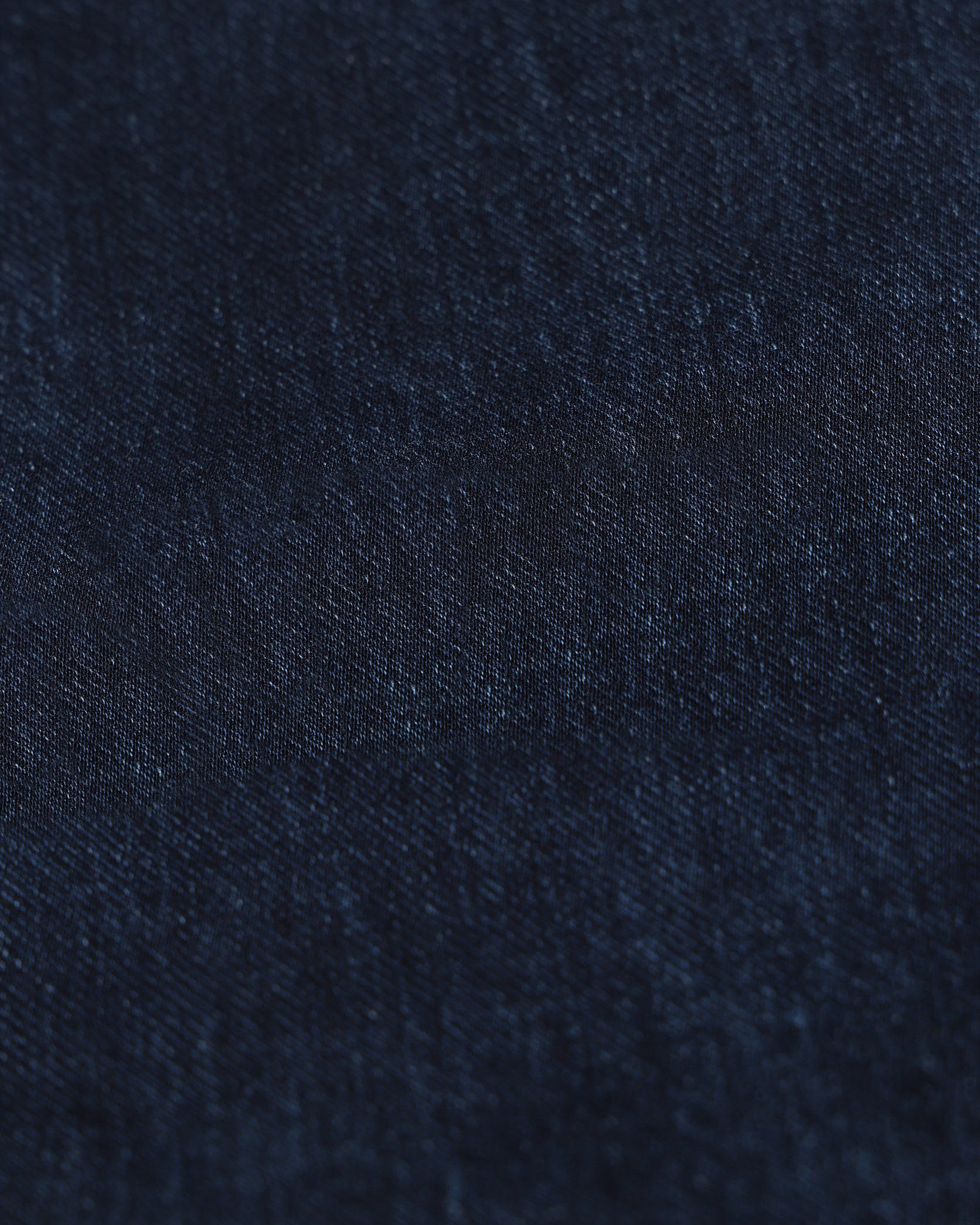 Navy blue fabric texture close-up