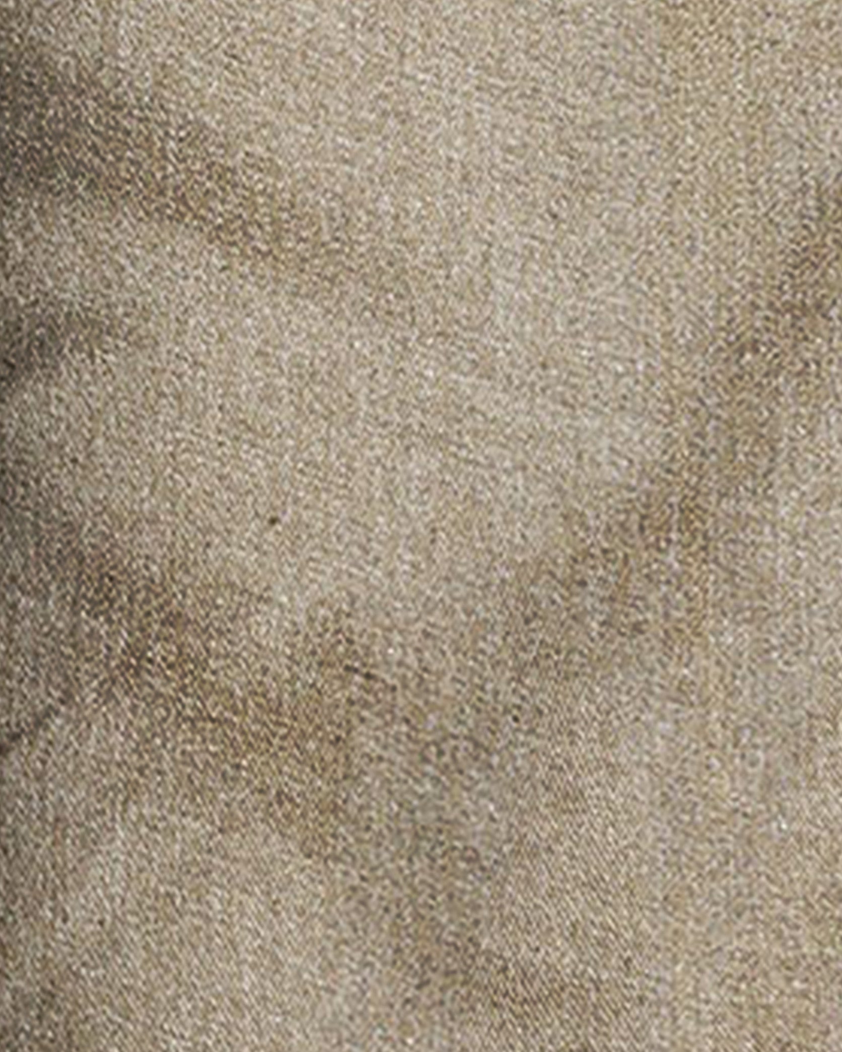 Close-up of a textured beige fabric surface