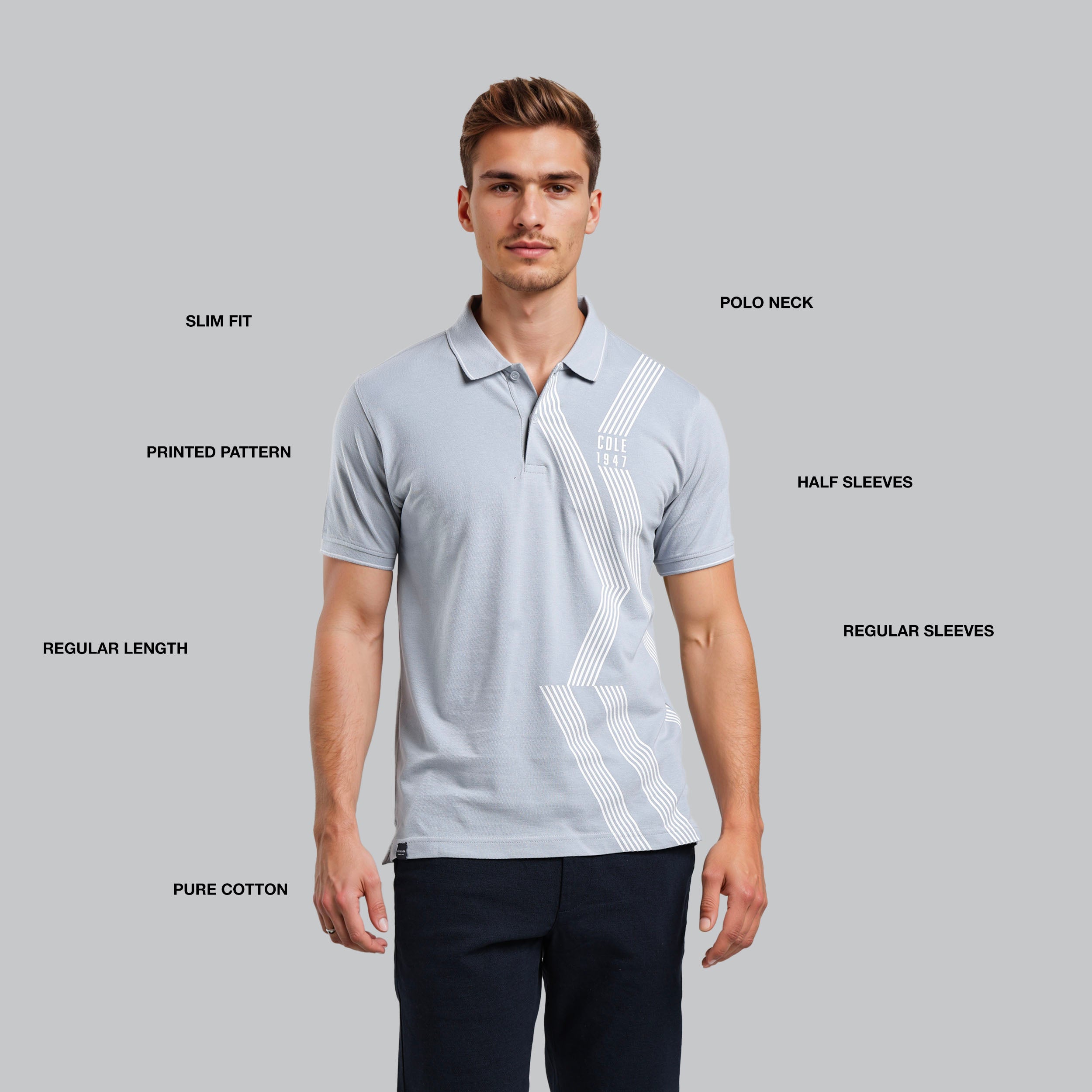 Man wearing a light gray polo shirt with white patterns on a gray background