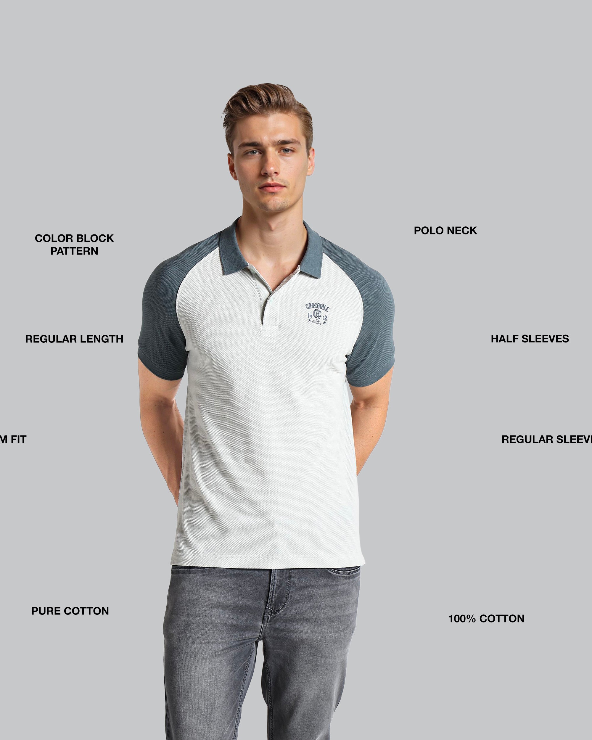 Man wearing a white and gray polo shirt with text labels on a gray background