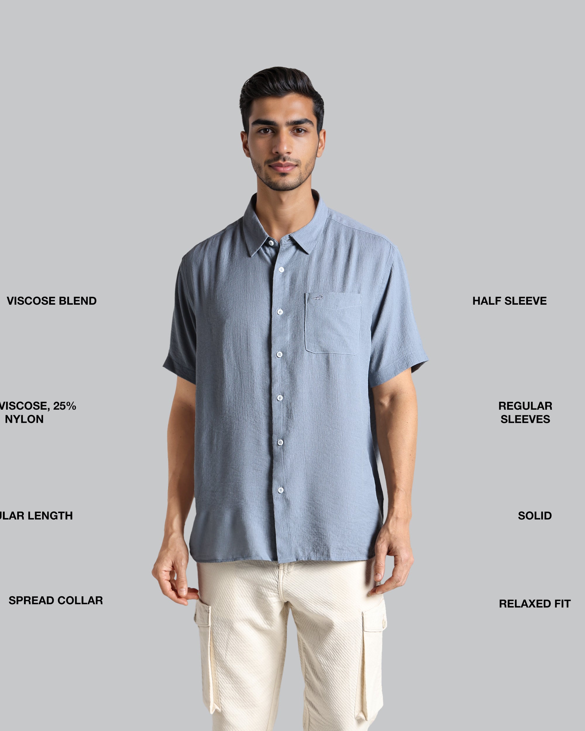 Man wearing a light blue shirt with text describing fabric blend, sleeve length, and other details on a gray background
