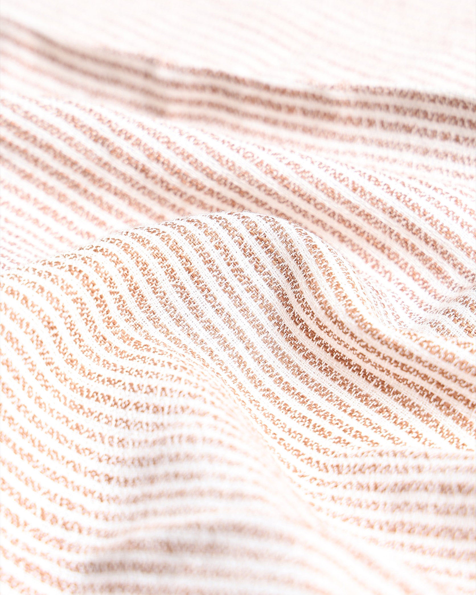 Close-up of textured fabric with wavy pattern