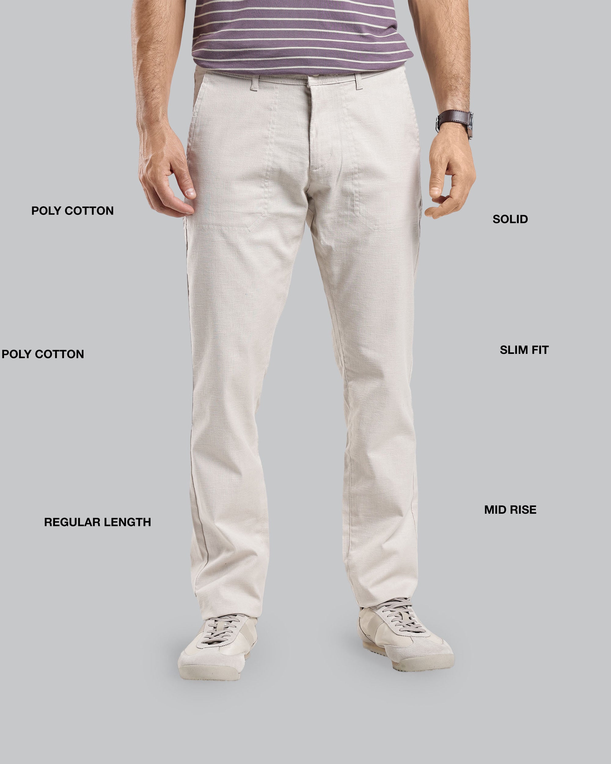 Person wearing beige pants with text labels on a gray background
