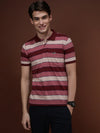 Man wearing a red maroon red striped polo t shirt on a light gray background