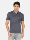 Man wearing a grey striped casual grey polo t shirt on a light gray background