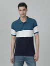 Man wearing a blue blue coral striped polo t shirt on a light gray background