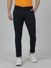 Man wearing a navy solid casual navy trouser on a light gray background