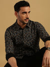 Man wearing a brown brown printed casual full sleeve 100% cotton shirt with casual styling on a gray background