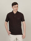 Man wearing a brown coffee brown solid casual polo t shirt with casual styling on a gray background