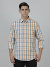 Man wearing a orange checked casual full sleeve 100% cotton shirt with casual styling on a gray background