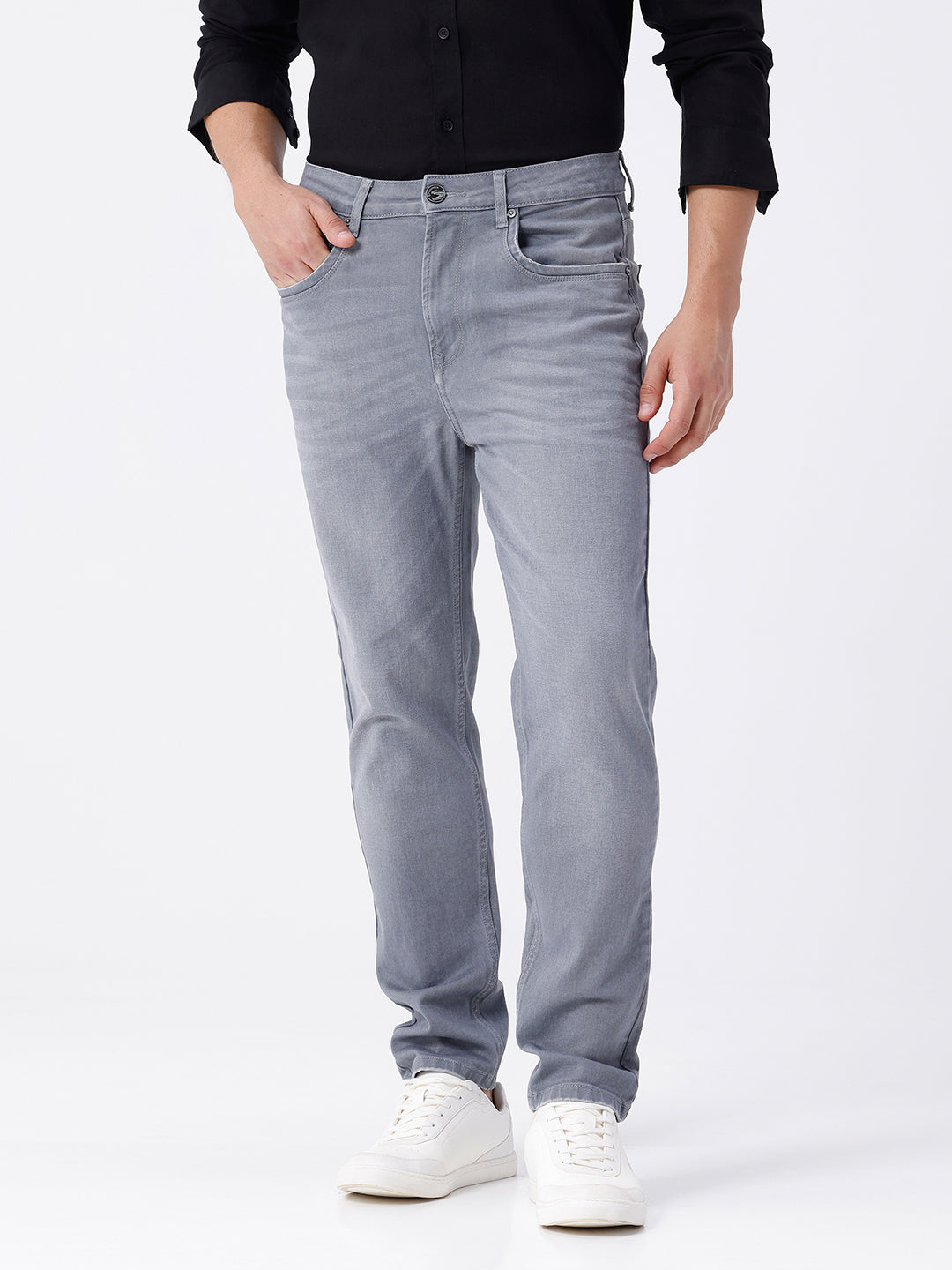 Woman wearing a grey grey twill denim on a light gray background